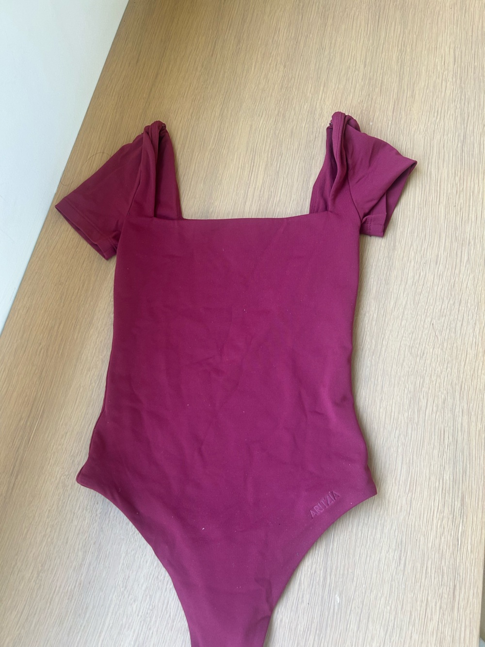 LIKE NEW ARITZIA BODYSUIT - size xxs in cardamom contour material